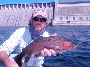 The White River Inn, Man trout fishing on the White River in Arkansas.