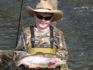 The White River Inn, Kid trout fishing on the White River in Arkansas.