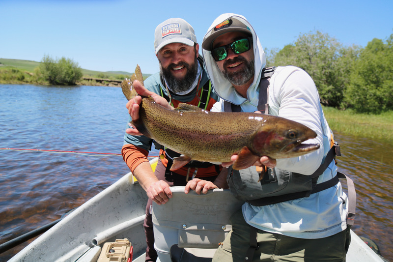 Trent with Yampa Valley Anglers guide, Tim Drummond, and a beautiful Cuttbow.