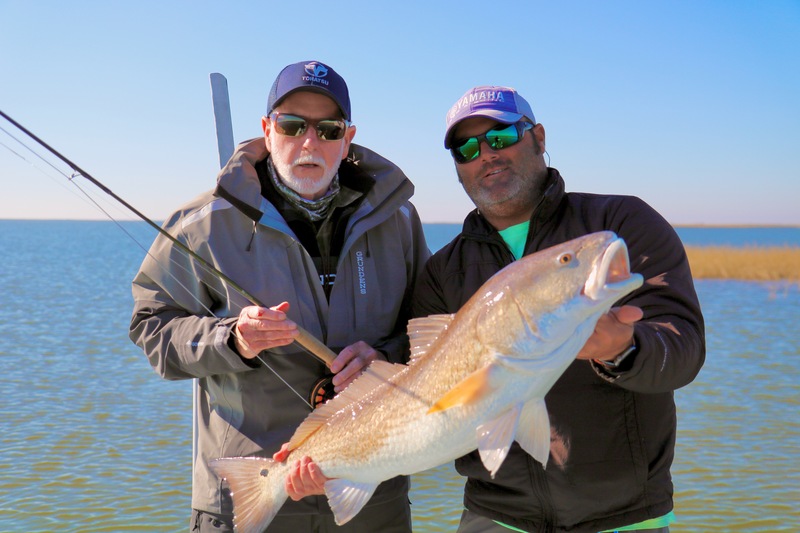 Tom Gazaway and guide Will Bertrand of Inshore Addiction Guides with great Redfish.