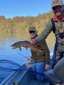 The White River Inn, Men trout fishing on the White River in Cotter, Arkansas